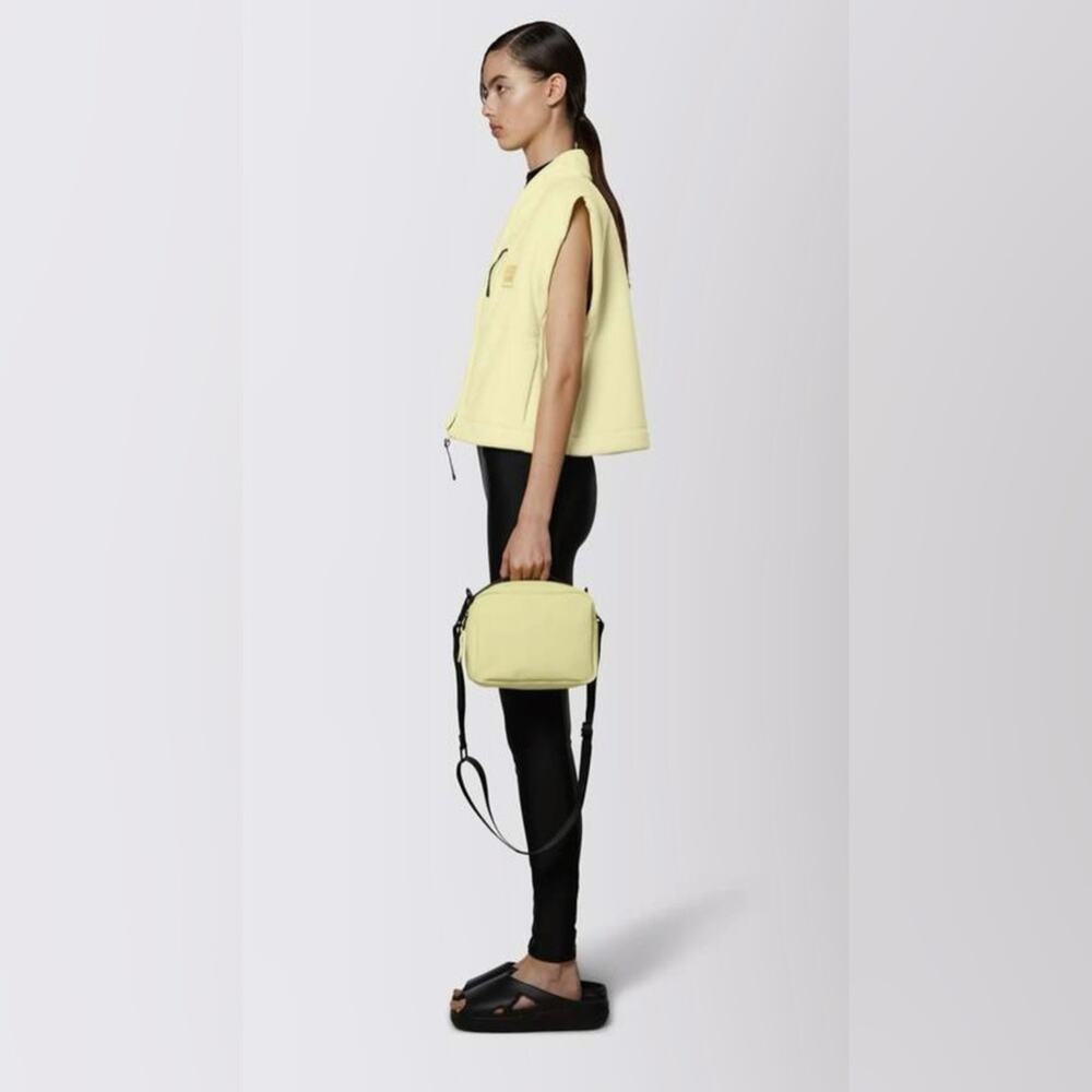 Rains NWT Box Waterproof yellow Crossbody Bag with Black Strap.